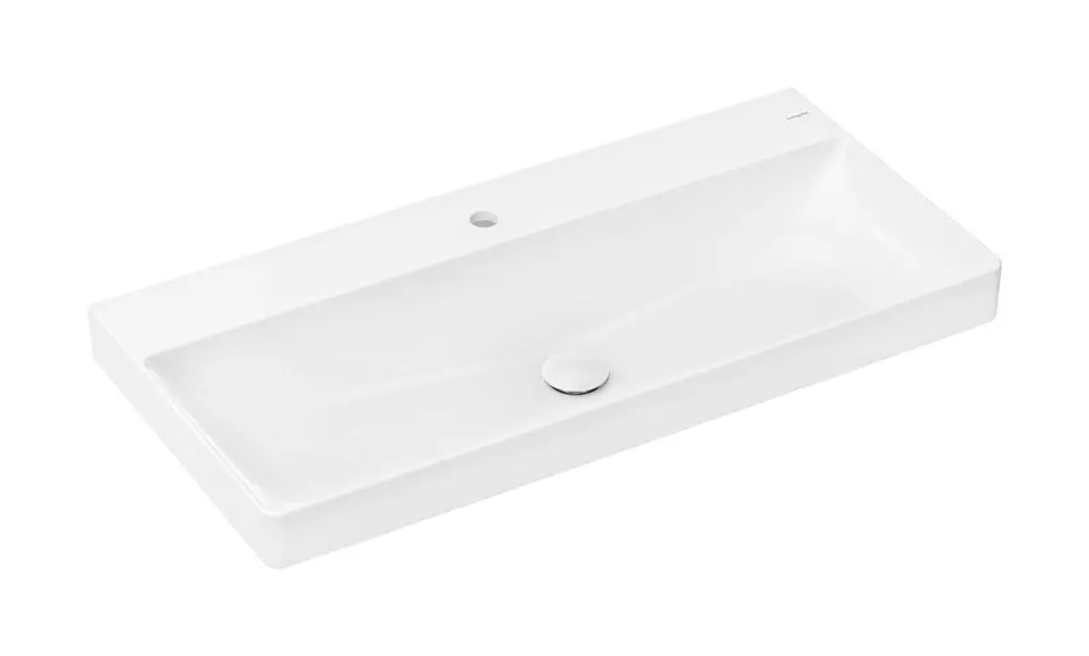 Weißer Waschtisch mit flacher, rechteckiger Form, einem Hahnloch in der Mitte und ohne Überlauf, hergestellt von Hansgrohe. Oberfläche eignet sich für die SmartClean-Technologie.